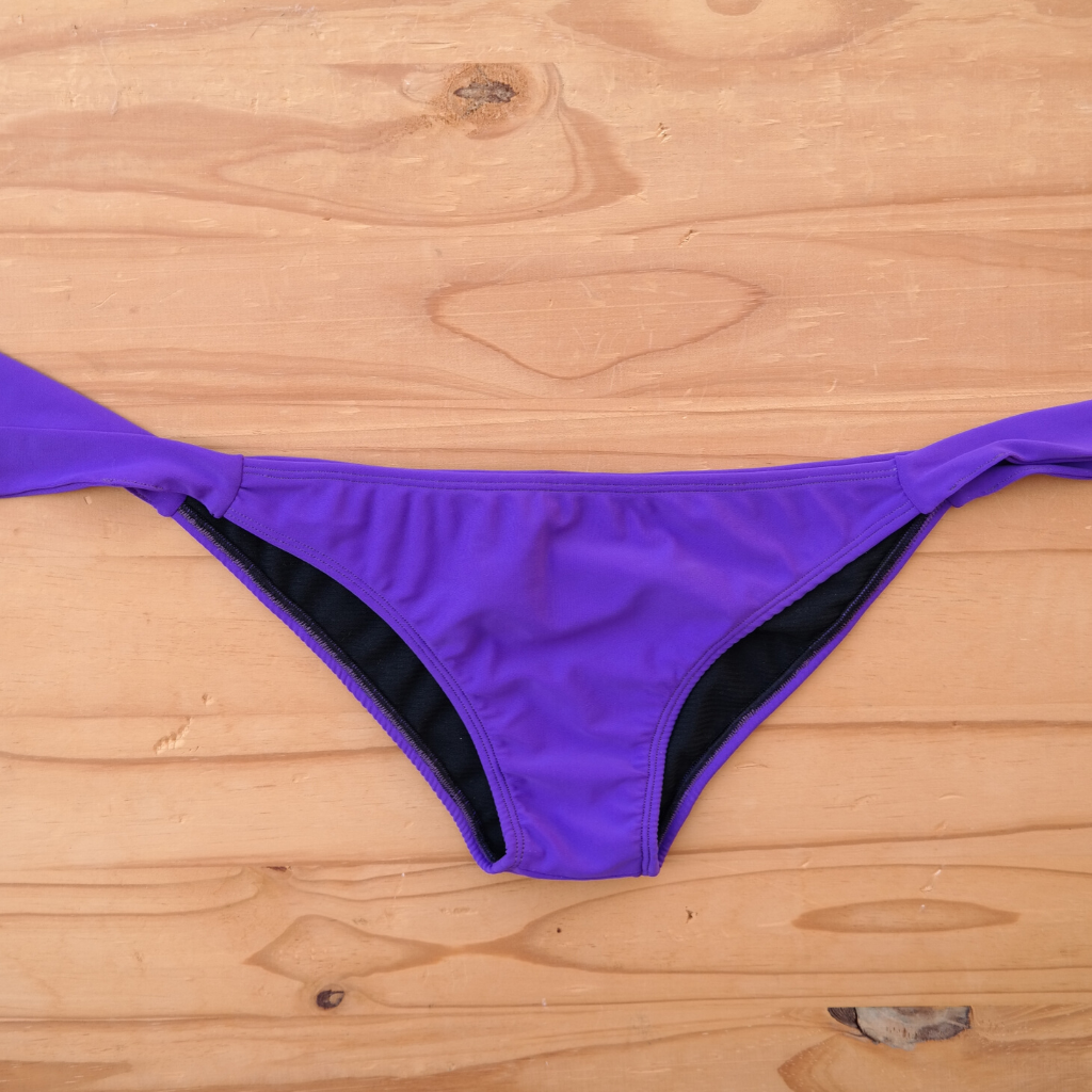 Purple - Classic Tie Style Bikini Bottom: classic tie bottom in purple solid colour. Handmade from nylon lyrca