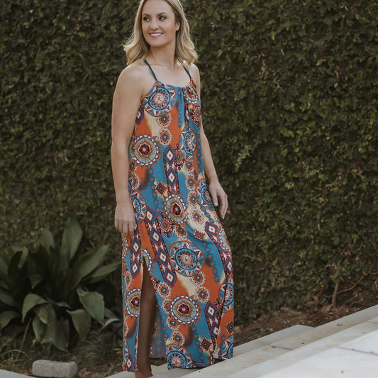 Rosie Dress - Dream Catcher: blue, orange and cream geometric patterned print, ankle length dress. String tie around the neck . Handmade from no crease material